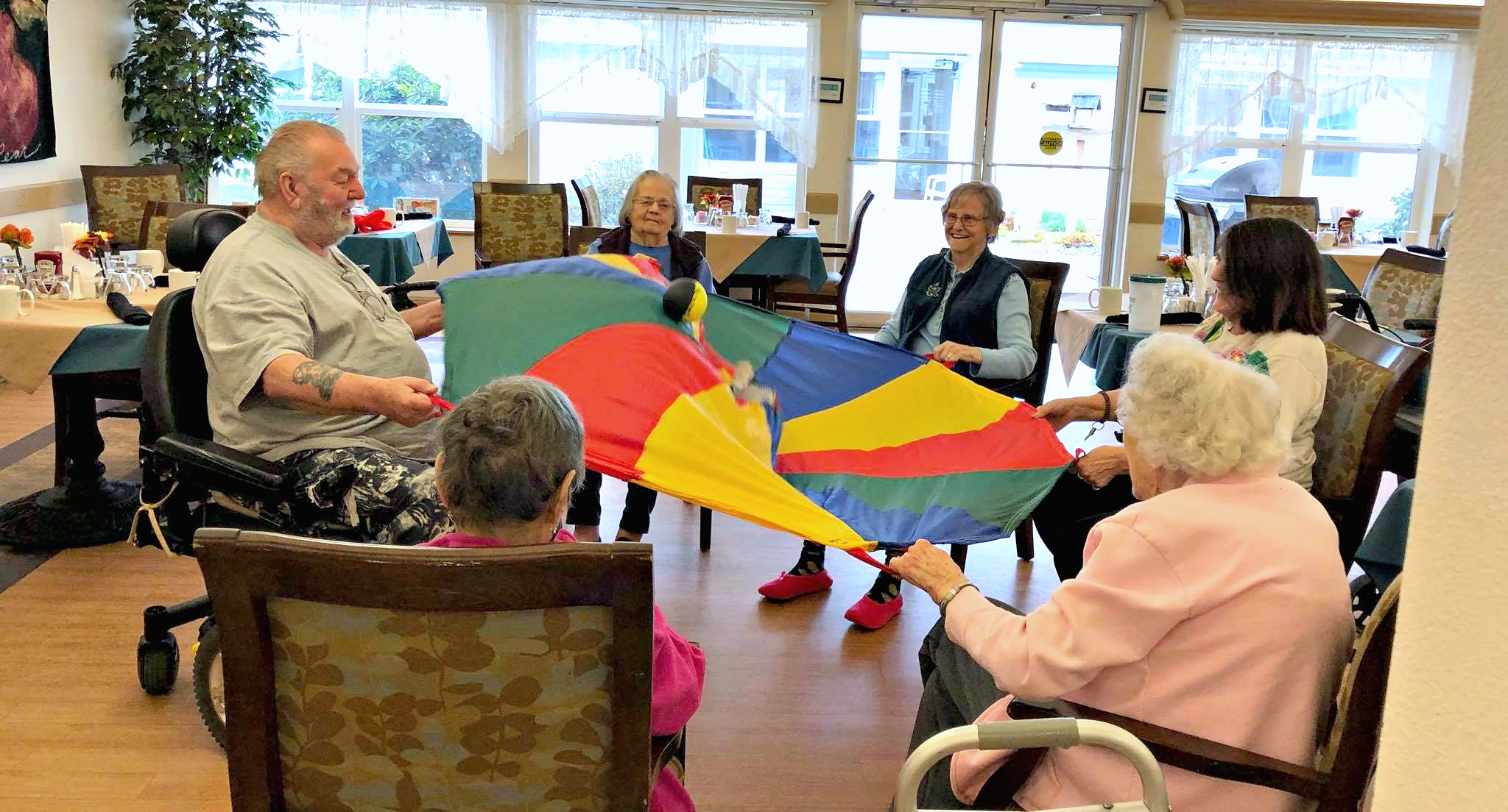 Elderly residents having some fun with a game